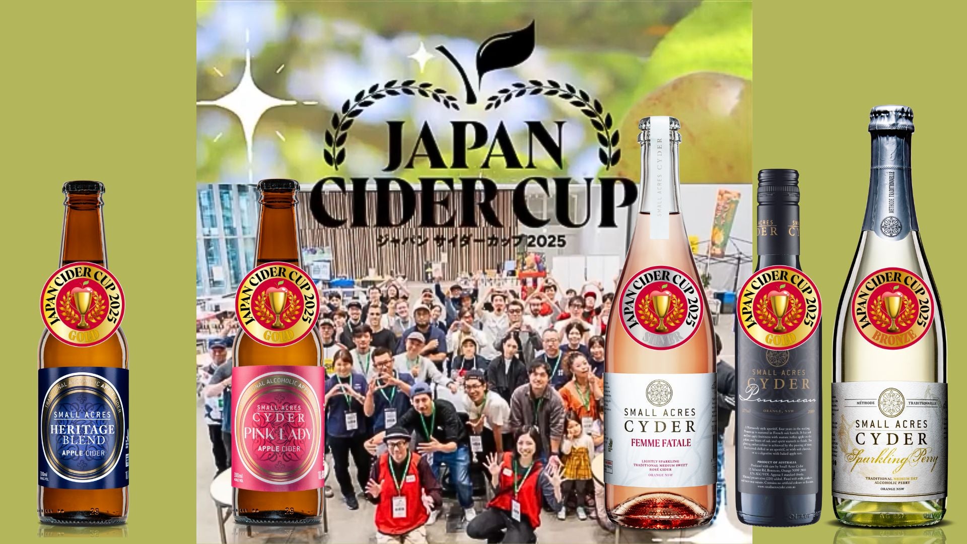 Bottles of cider with 'Japan Cider Cup' medals and a crowd at an event.