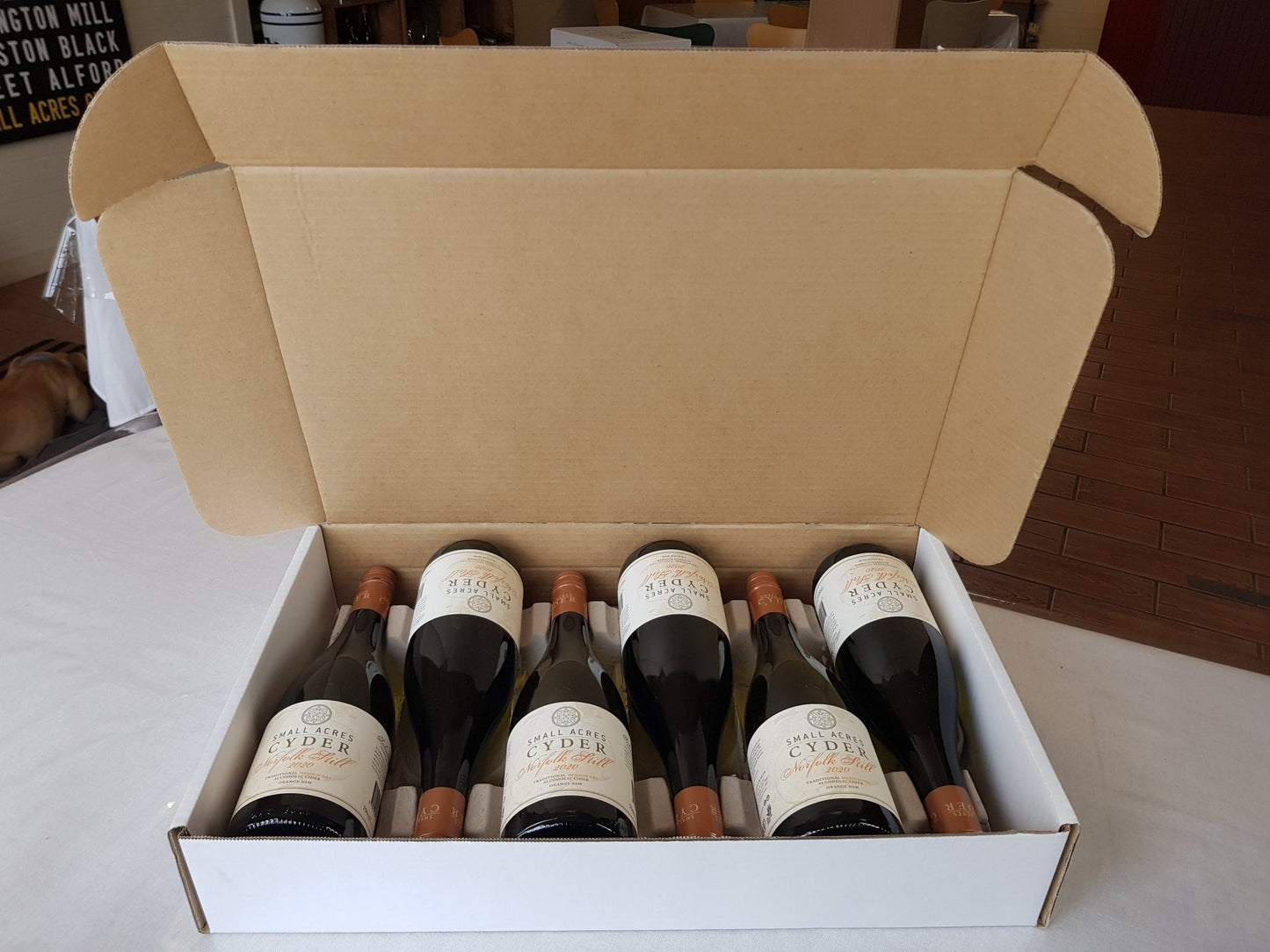 A flat packed case of 6 Norfolk Still 2021 Apple Cider - Small Acres Cyder